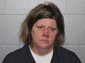 This booking photo provided by the Goodhue County, Minn., Sheriff's Office shows Jennifer Matter. Matter admitted in a guilty plea Wednesday, Jan. 25, 2023, that she left her newborn baby boy to die on the banks of the Mississippi River in 2003.