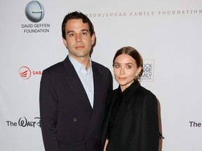 Louis Eisner and Ashley Olsen attend the YES 20th Anniversary Celebration gala on Sept. 23, 2021.