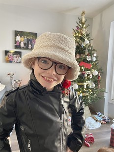 Fund chairkid Madi Ambos, 9, in her new Christmas leather jacket.