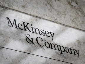 This photograph taken on April 12, 2022, shows a sign of U.S.-based McKinsey & Company management consulting firm in Geneva.