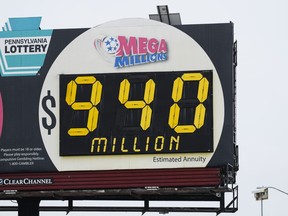 A billboard along Interstate 95 advertise the Mega Millions jackpot in Philadelphia, Wednesday, Jan. 4, 2023.