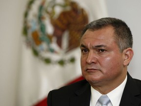 Mexico's Secretary of Public Safety, Genaro Garcia Luna, attends a press conference on the sidelines of an American Police Community meeting in Mexico City, Oct. 8, 2010.