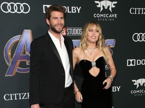 Miley Cyrus and Liam Hemsworth seen in April 2019 at the Endgame premiere.