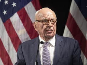 Rupert Murdoch introduces Secretary of State Mike Pompeo during the Herman Kahn Award Gala, in New York, Oct. 30, 2018.