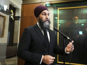 NDP leader Jagmeet Singh speaks to reporters in the foyer of the House of Commons on Parliament Hill in Ottawa, Dec. 14, 2022.