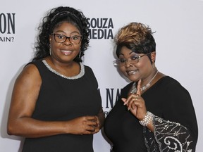 Lynnette Hardaway, left, and Rochelle Richardson, a.k.a. Diamond and Silk, arrive at the Los Angeles premiere of "Death of a Nation" at the Regal Cinemas at L.A. Live, July 31, 2018, in Los Angeles.