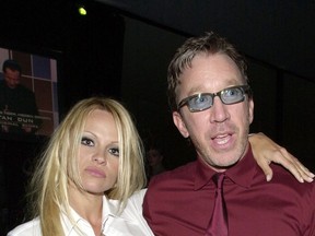 Pamela Anderson and Tim Allen at the Elton John Oscars Party in 2001.