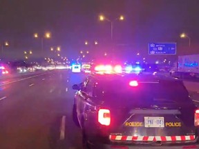 Ontario Provincial Police shut down the westbound express lanes of Hwy. 401 between Renforth and Dixie Rds., in Mississauga, after a man was struck and killed while outside of a vehicle on Wednesday, Jan. 11, 2023.