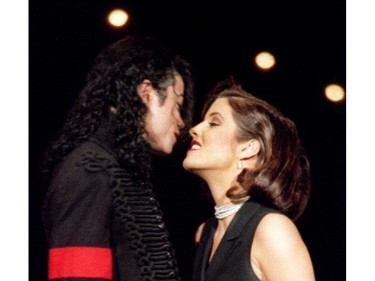Michael Jackson and Lisa Marie Presley stare into each other's eyes at the 11th Annual MTV Video Music Awards in New York, Sept. 8, 1994.