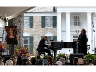 Alanis Morissette performs during a public memorial for singer Lisa Marie Presley, the only daughter of the "King of Rock 'n' Roll," Elvis Presley, at Graceland Mansion in Memphis, Tenn., Jan. 22, 2023.