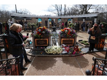 Music fans attend a public memorial for singer Lisa Marie Presley, the only daughter of the "King of Rock 'n' Roll," Elvis Presley, at Graceland Mansion in Memphis, Tenn., Jan. 22, 2023.