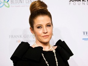 Singer Lisa Marie Presley arrives at the Elton John AIDS Foundation's 12th Annual "An Enduring Vision" benefit gala at Cipriani in New York City, Oct. 15, 2013.