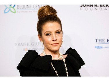 Singer Lisa Marie Presley arrives at the Elton John AIDS Foundation's 12th Annual "An Enduring Vision" benefit gala at Cipriani in New York City, Oct. 15, 2013.