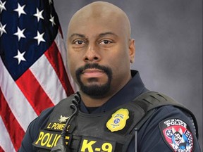 Former Sgt. Lewis Powell with K9 unit of La Vergne Police Department. (Facebook)
