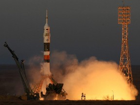 Russia's Soyuz MS-11 spacecraft carrying members of the International Space Station expedition 58/59, Russian cosmonaut Oleg Kononenko, NASA astronaut Anne McClain and David Saint-Jacques of the Canadian Space Agency, blasts off to the ISS from the launch pad at the Russian-leased Baikonur cosmodrome in Kazakhstan, Dec. 3, 2018.