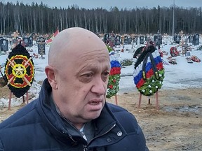 Wagner Group head Yevgeny Prigozhin attends the funeral of Dmitry Menshikov, a fighter of the Wagner group who died during a special operation in Ukraine, at the Beloostrovskoye cemetery outside St. Petersburg, Russia, Saturday, Dec. 24, 2022.
