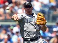 Scott Rolen throws to first base during a game against the New York Yankees on July 6, 2009, while he was a member of the Toronto Blue Jays.