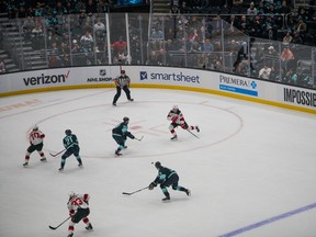 Jack Hughes (#86) is leading New Jersey to a breakout season.