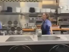 Waffle House employee after catching chair thrown at her.