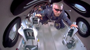 Billionaire Richard Branson floats in zero gravity on board Virgin Galactic’s passenger rocket plane VSS Unity after reaching the edge of space above Spaceport America near Truth or Consequences, New Mexico, U.S. July 11, 2021 in a still image from video. Virgin Galactic/Handout via REUTERS