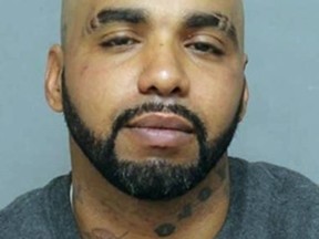 Terrance Hili, 42, of Toronto, is accused pushing another man onto the tracks at Bloor-Yonge TTC station on Feb. 19, 2023.