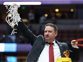 Head coach Chris Beard of the Texas Tech Red Raiders cuts the net after defeating the Gonzaga Bulldogs during the 2019 NCAA Men's Basketball Tournament West Regional at Honda Center on March 30, 2019 in Anaheim, California.