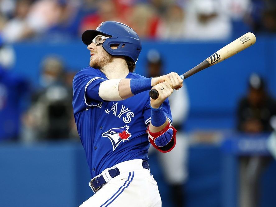 Apr 10, 2021: Toronto Blue Jays catcher Danny Jansen #9 is tended