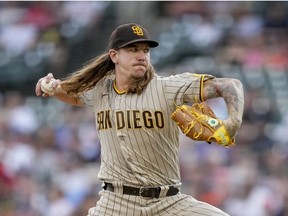 Mike Clevinger of the San Diego Padres delivers a pitch against the Detroit Tigers during the bottom of the first inning at Comerica Park on July 26, 2022 in Detroit, Michigan.