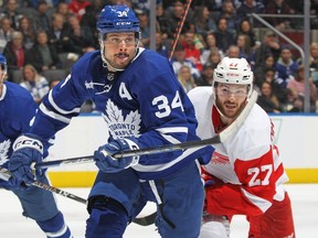 Auston Matthews of the Toronto Maple Leafs skates against Michael Rasmussen of the Detroit Red Wings during an NHL game at Scotiabank Arena on January 7, 2023 in Toronto, Ontario, Canada.