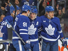 Mitchell Marner #16 of the Toronto Maple Leafs celebrates a goal against the Boston Bruins during an NHL game at Scotiabank Arena on February 1, 2023 in Toronto.