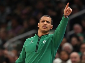 Boston Celtics coach Joe Mazzulla directs his team against the Phoenix Suns at TD Garden on February 03, 2023 in Boston, Massachusetts.