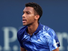 Felix Auger-Aliassime of Canada looks on against Maxime Cressy of USA during day ten of the Dubai Duty Free Tennis at Dubai Duty Free Tennis Stadium on February 28, 2023 in Dubai, United Arab Emirates.