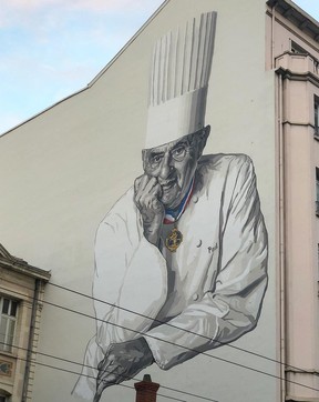 A mural of late chef Paul Bocuse on the side of a building in Lyon, France – supplied