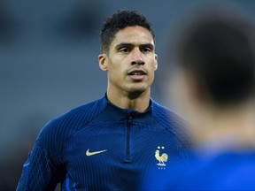 In this photo taken on December 17, 2022 France's defender Raphael Varane takes part in a training session at the Al Sadd SC training centre in Doha, on the eve of the Qatar 2022 World Cup football final match between Argentina and France.