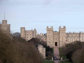 In this file photo taken on Feb. 17, 2022 a general view shows The Round Tower (left) and The Long Walk leading to Windsor Castle.