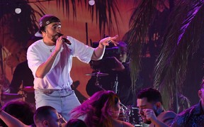 Puerto Rican singer Bad Bunny performs during the 65th Annual Grammy Awards at the Crypto.com Arena in Los Angeles on February 5, 2023. (Photo by VALERIE MACON / AFP)