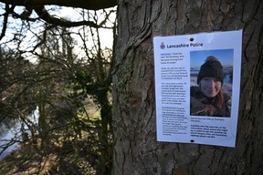 A poster asking for information on missing Nicola ‘Nikki’ Bulley is pictured on a tree close to where her phone and dog’s harness were discovered, by the banks of the River Wyre, in St Michael’s on Wyre, near Preston, north west England on February 6, 2023, as the search for her continues. (Photo by PAUL ELLIS/AFP via Getty Images)