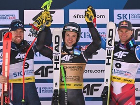 Winner James Crawford of Canada, centre, is flanked by second placed Norway's Aleksander Aamodt Kilde (L) and third placed France's Alexis Pinturault on the podium for the Men's Super-G event of the FIS Alpine Ski World Championship 2023 in Courchevel, French Alps, on February 9, 2023.