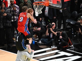 Basketball player Mac McClung, of the Philadelphia 76ers, competes during the Slam Dunk Contest of the NBA All-Star week-end in Salt Lake City, Utah, February 18, 2023.