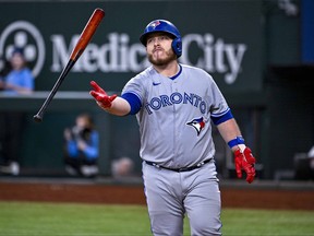Sep 11, 2022; Arlington, Texas, USA; Toronto Blue Jays catcher Alejandro Kirk tosses his bat after he strikes out against the Texas Rangers during the eighth inning at Globe Life Field.