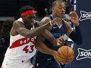 Feb 5, 2023; Memphis, Tennessee, USA; Toronto Raptors forward Pascal Siakam (43) and Memphis Grizzlies forward Xavier Tillman (2) battle for for the ball during the second half at FedExForum. Petre Thomas-USA TODAY Sports