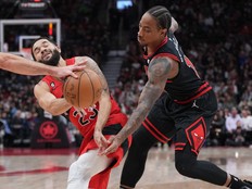 Nov 6, 2022; Toronto, Ontario, CAN; Toronto Raptors guard Fred VanVleet (23) controls the ball as Chicago Bulls forward DeMar DeRozan (11) tries to defend during the first quarter at Scotiabank Arena.