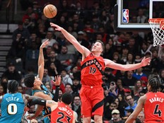 Toronto Raptors center Jakob Poeltl blocks a shot from Detroit Pistons guard Killian Hayes in the first half at Scotiabank Arena.