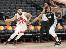 Toronto Raptors guard Fred VanVleet drives to the net against San Antonio Spurs forward Keita Bates-Diop during the second half at Scotiabank Arena.