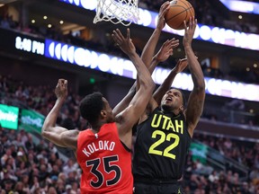 Utah Jazz forward Rudy Gay goes to the basket against Toronto Raptors center Christian Koloko in the third quarter at Vivint Arena.