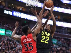 Utah Jazz forward Rudy Gay goes to the basket against Toronto Raptors center Christian Koloko in the third quarter at Vivint Arena.