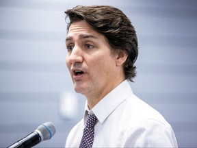 Prime Minister Justin Trudeau takes questions from media, at the SEIU Healthcare union office in Richmond Hill, Ont. February 22, 2023.