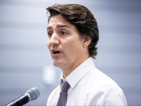 Prime Minister Justin Trudeau takes questions from media, at the SEIU Healthcare union office in Richmond Hill, Ont. Feb. 22, 2023.
