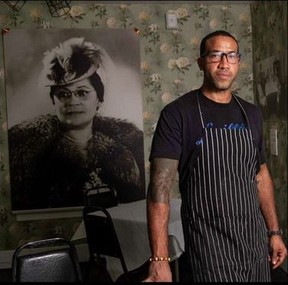 Chef Chris Williams with a portrait of his great-grandmother, , Lucille Elizabeth Bishop Smith – supplied