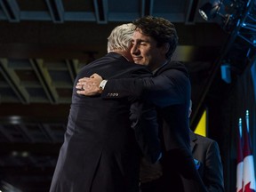 Prime Minister Justin Trudeau awards Dominic Barton, Global Managing Partner at Mckinsey and Company. Trudeau hosted the Public Policy Testimonial Dinner in Toronto on Thursday, April 20, 2017.